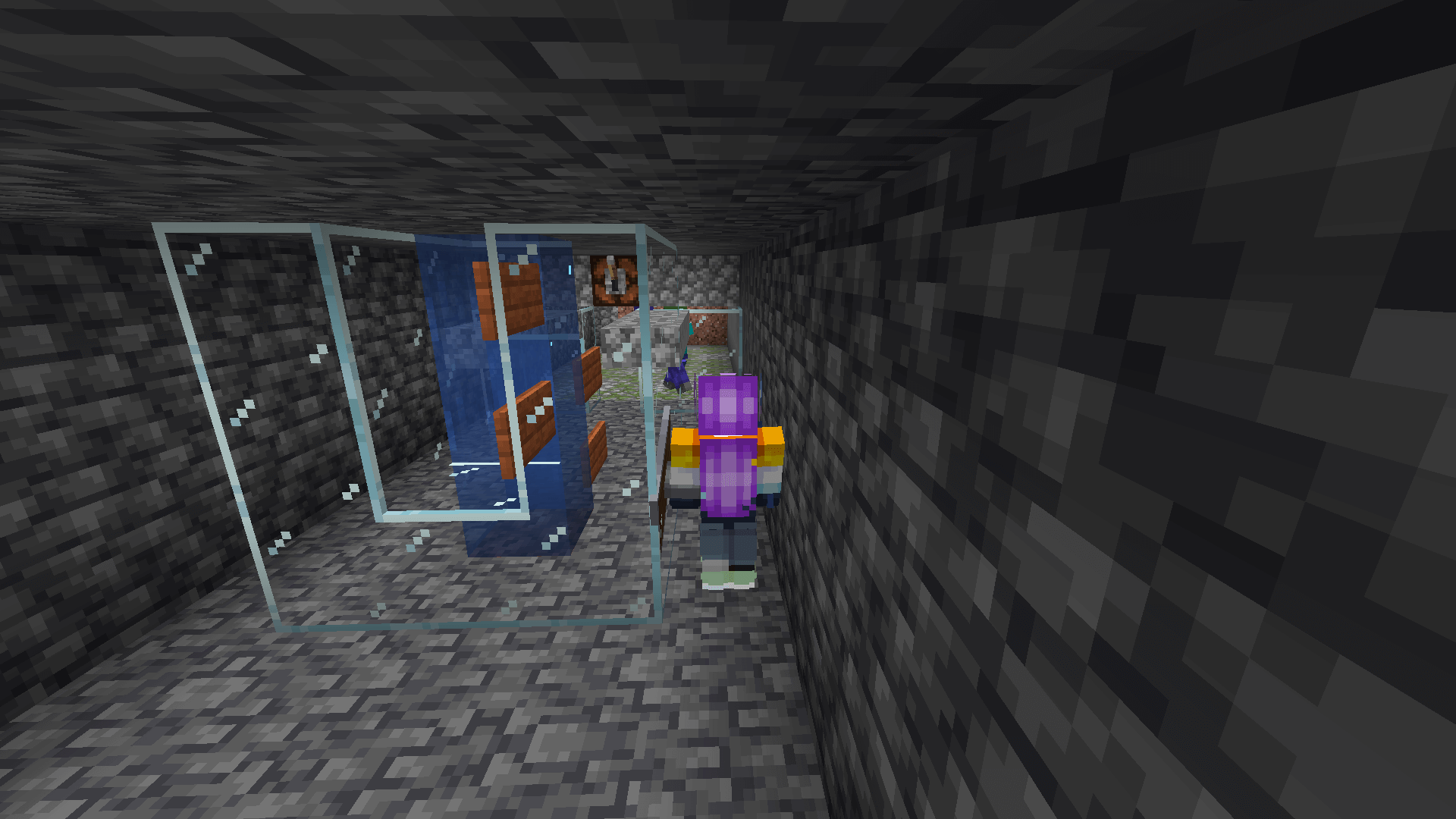 Come and get meee! *groan* *WHOOSH* A Minecraft player stands in front of a zombie spawner room. Beside the player is a bubble column surrounded by glass and signs.