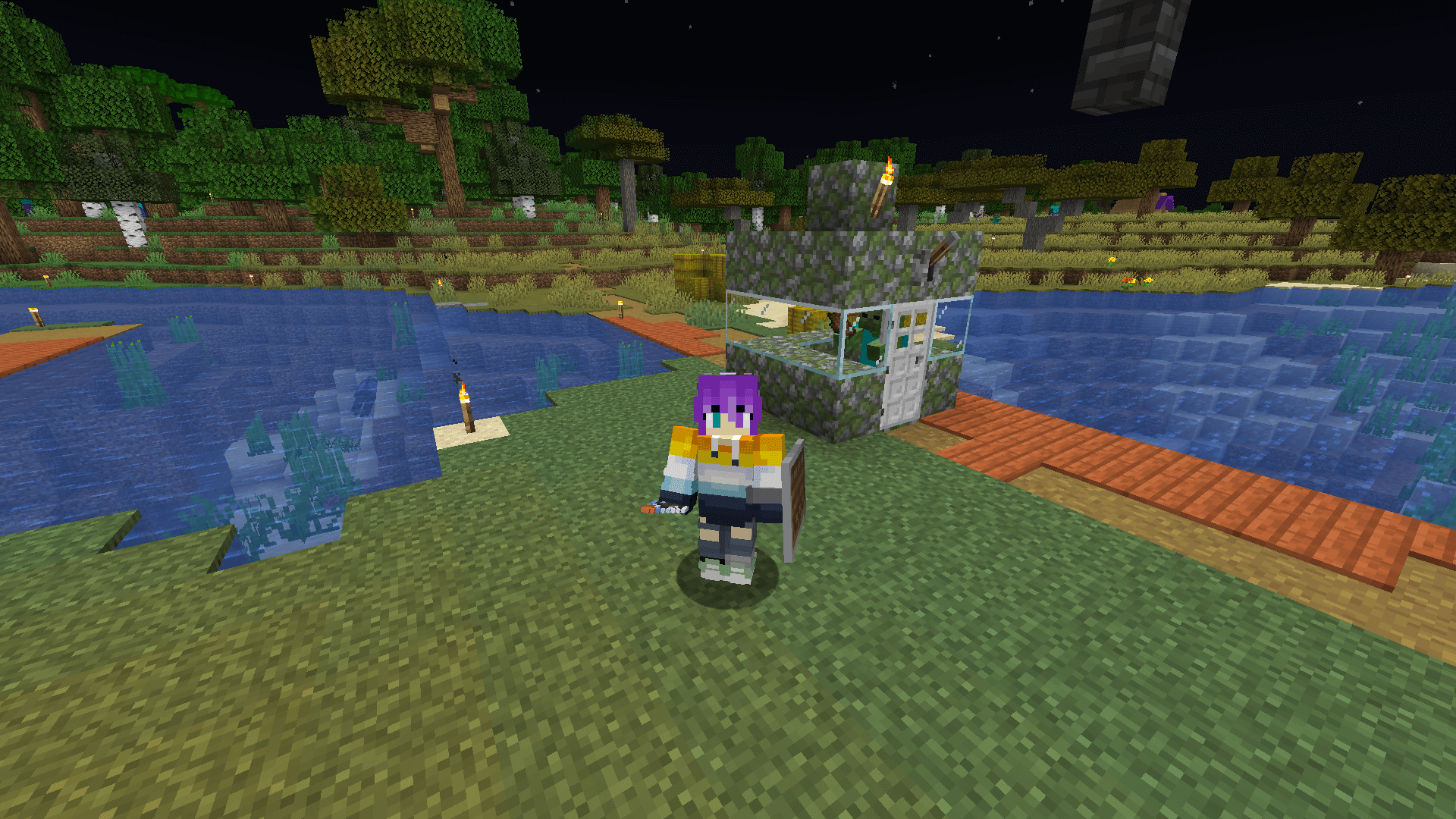 Sure, I could have pulled one of the many zombies from the forest. But this is MY zombie! A small mossy cobblestone and glass structure with a zombie inside.