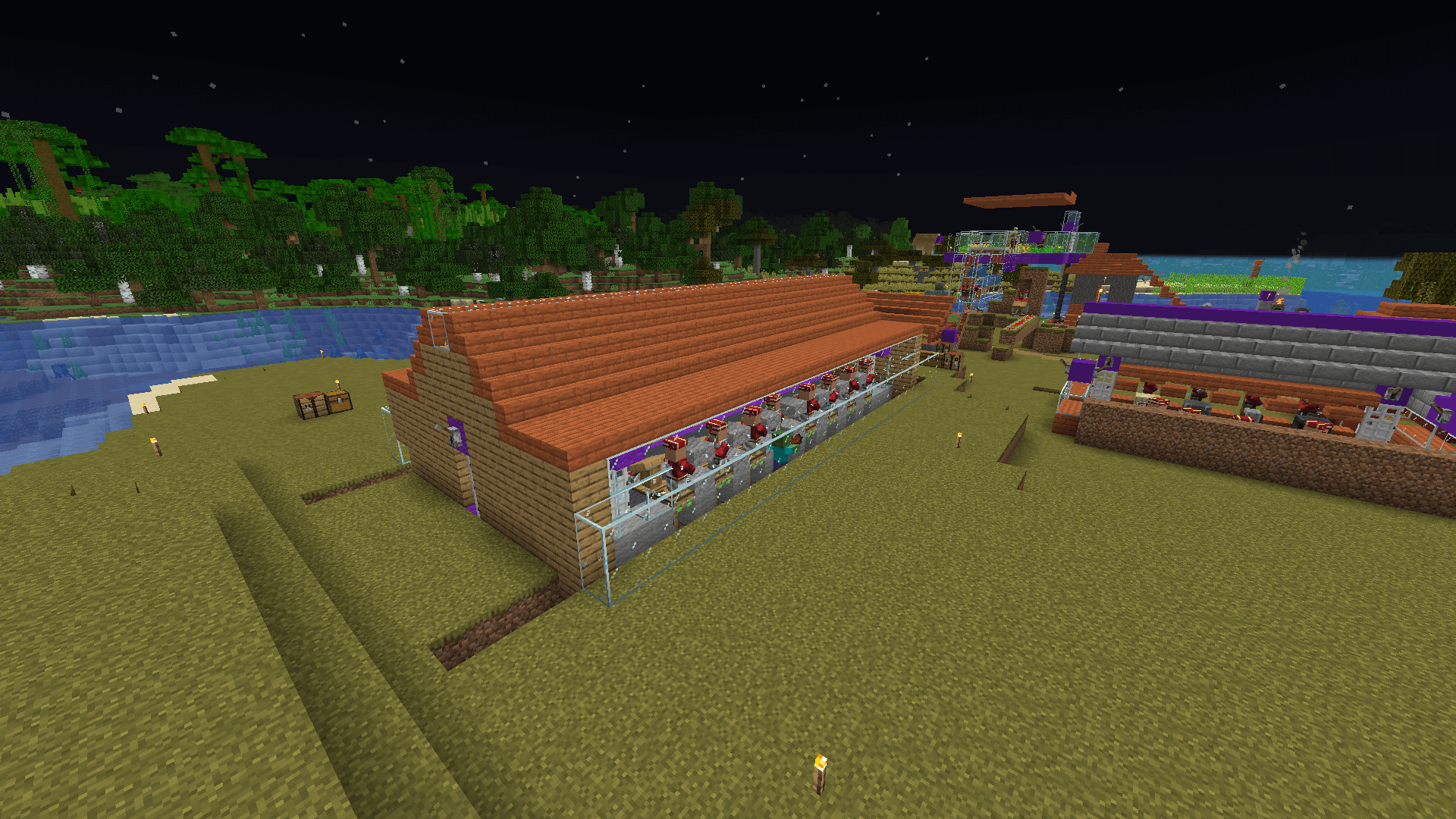 I've built the back, the sides, and the top! Sadly I can't say the same about the foundry XD An acacia, oak and glass structure housing many librarian villagers, with other village buildings and forests in the background.