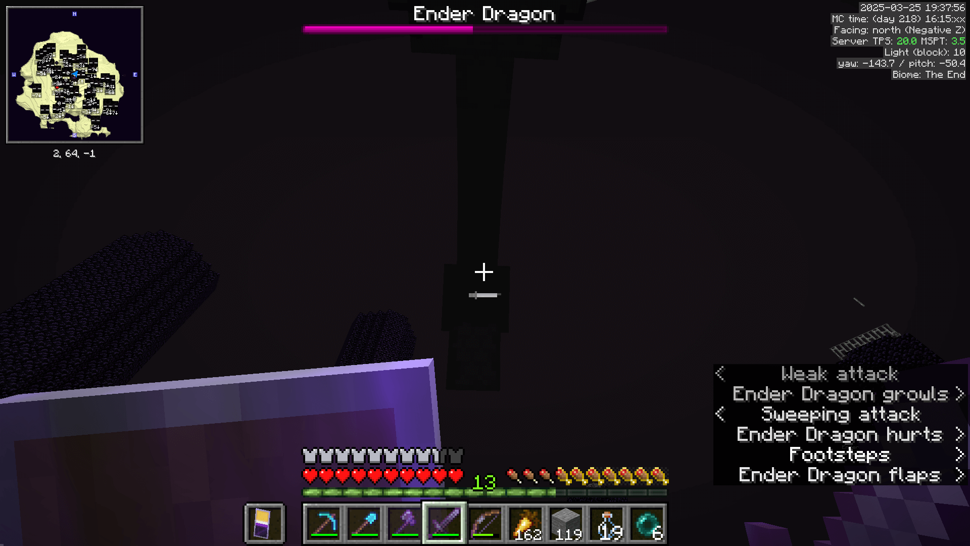 Attacking the Ender Dragon with a sword from below, positioned inside the central portal area.