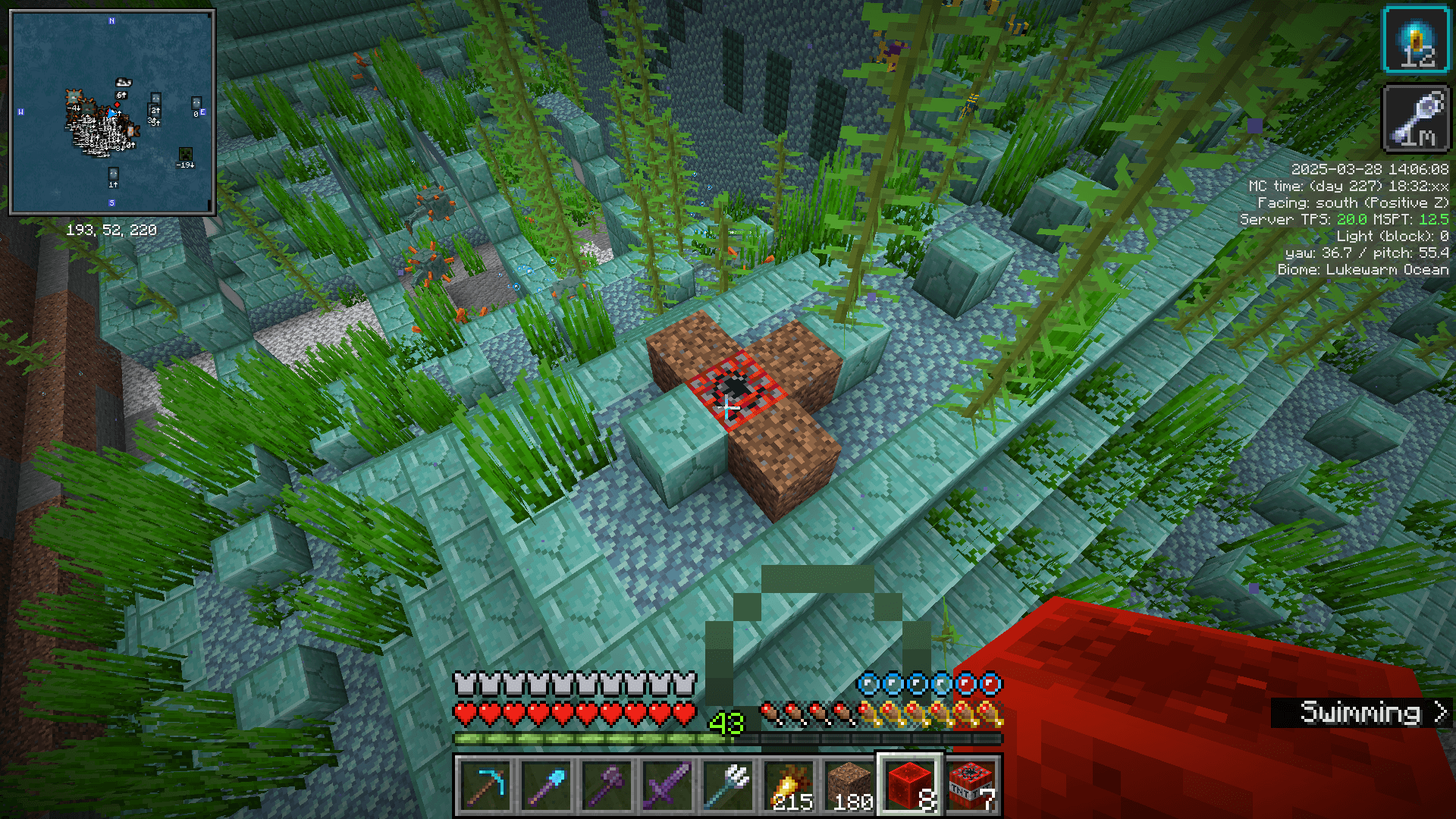 "Hey, if we're underwater, how can there be a –" A TNT block placed on top of an ocean monument and partially surrounded by dirt.
