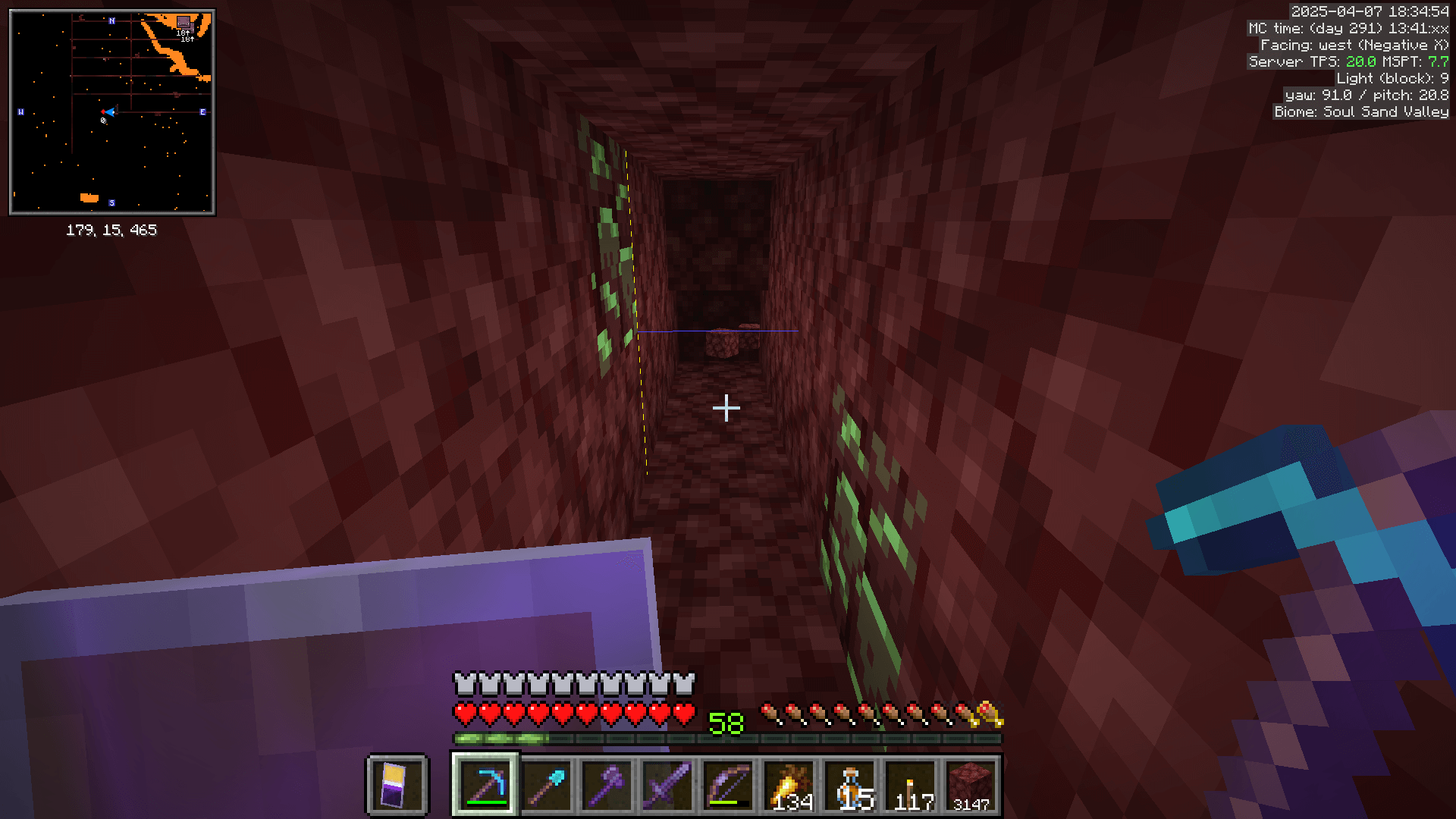 This is why they tell you to mine the chunk borders! A tunnel through netherrack with an exposed ancient debris bock in each wall. The chunk border HUD is turned on, showing that these blocks are in different chunks.