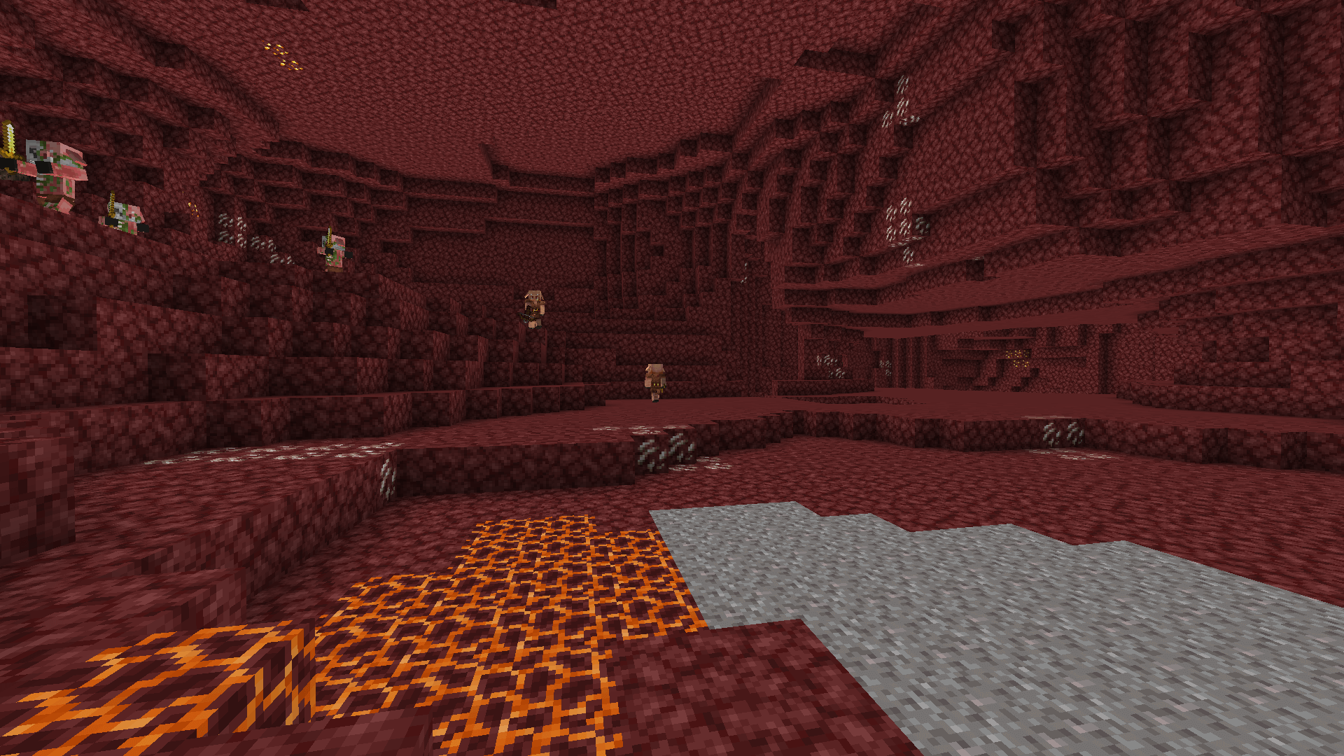 This is the spot! There's more behind the wall :) A small cavern in the nether wastes. There are patches of magma and gravel on the floor, and a few piglins and zombified piglins wandering around.