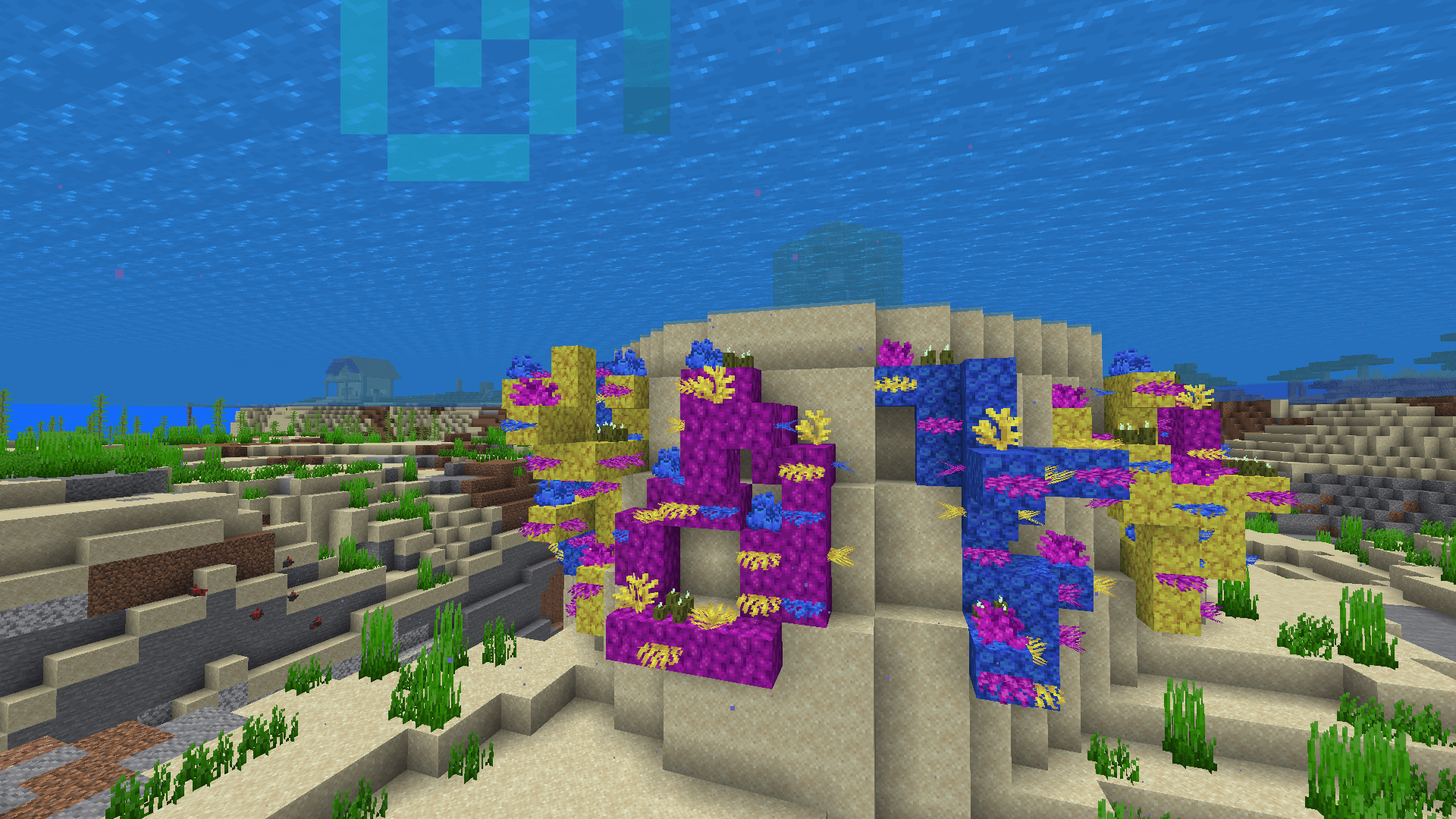 A REEF-freshing splash of colour! A rounded structure of sand, with decorated coral structures around the outside.