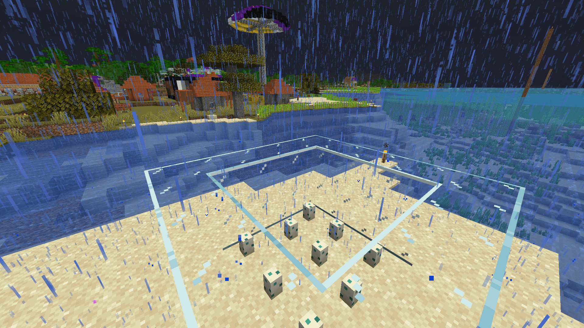 A 3 by 3 grid of turtle eggs encased by glass on a small platform of sand, just across the river from Elaville.