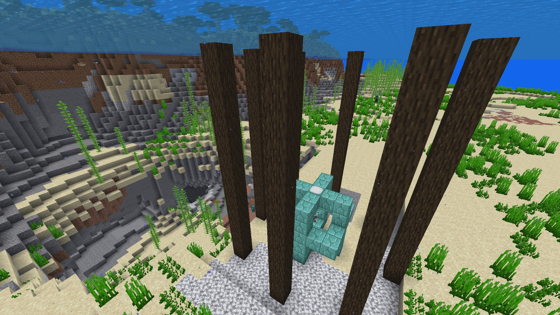 A ring of dark oak pillars rising from the sea floor, centred around a conduit. In the background is a sea cavern that leads to a geode.