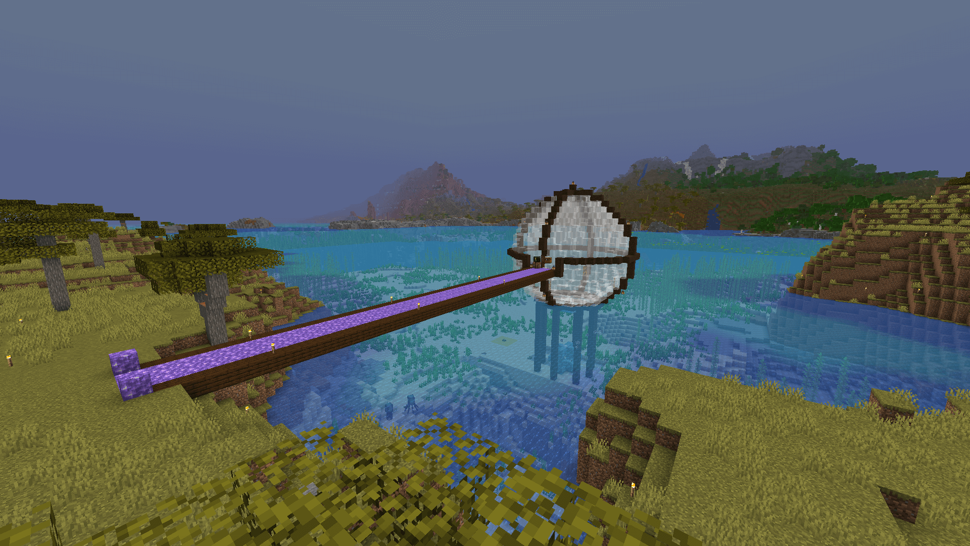 A white glass sphere in a bay, wrapped by dark oak blocks. A bridge of amethyst blocks connects the sphere to the land.