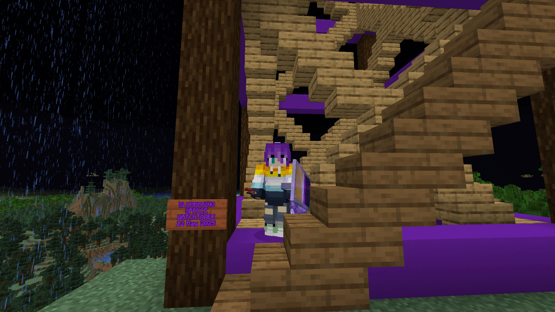 Ela stands at the base of the watchtower, beside a sign that reads: SLUMBERING SPRUCE WATCHTOWER 12 May 2025.