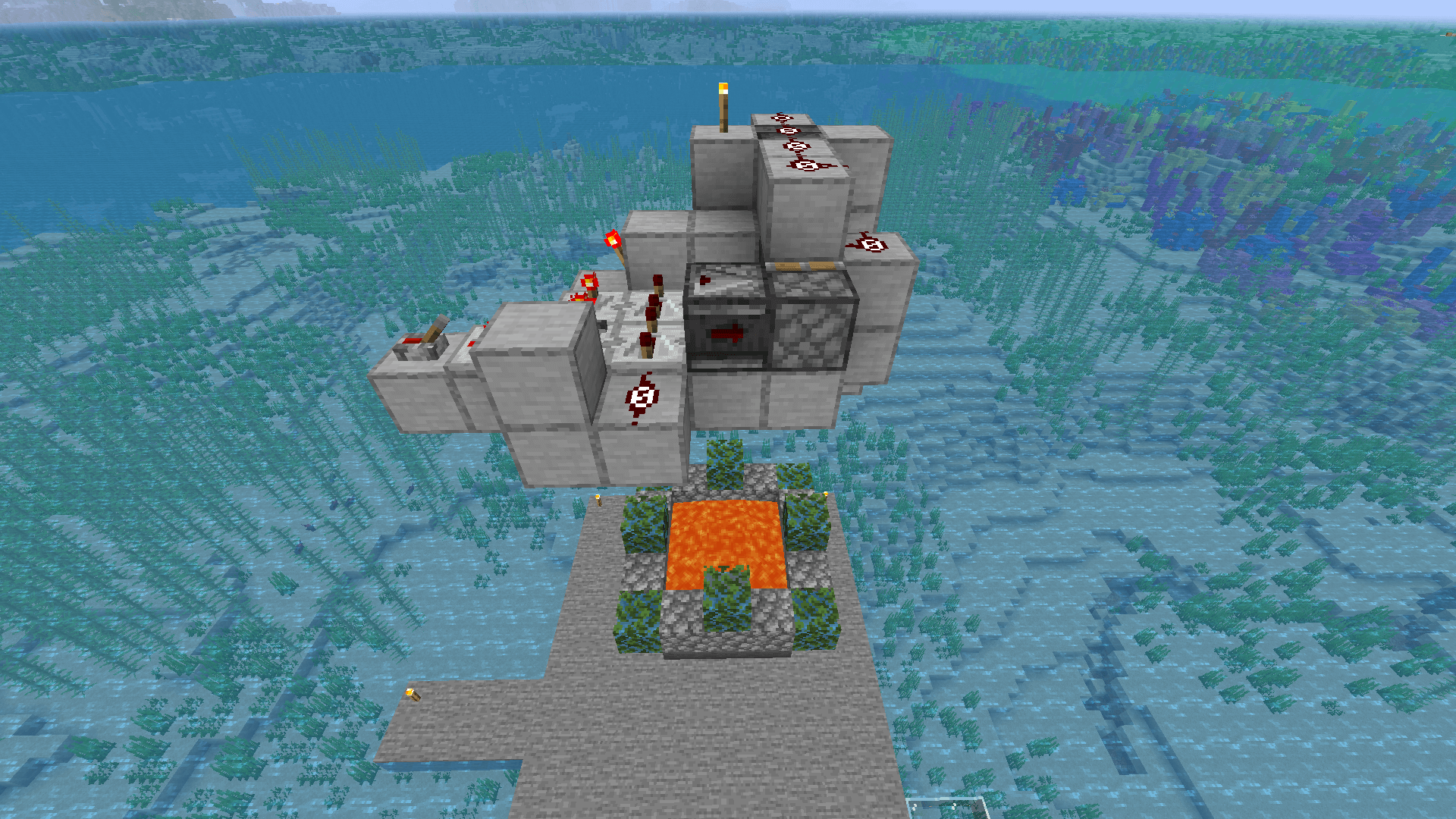 A TNT-duper cobblestone farm, consisting of a redstone contraption suspended over a pool of lava, surrounded by ocean.