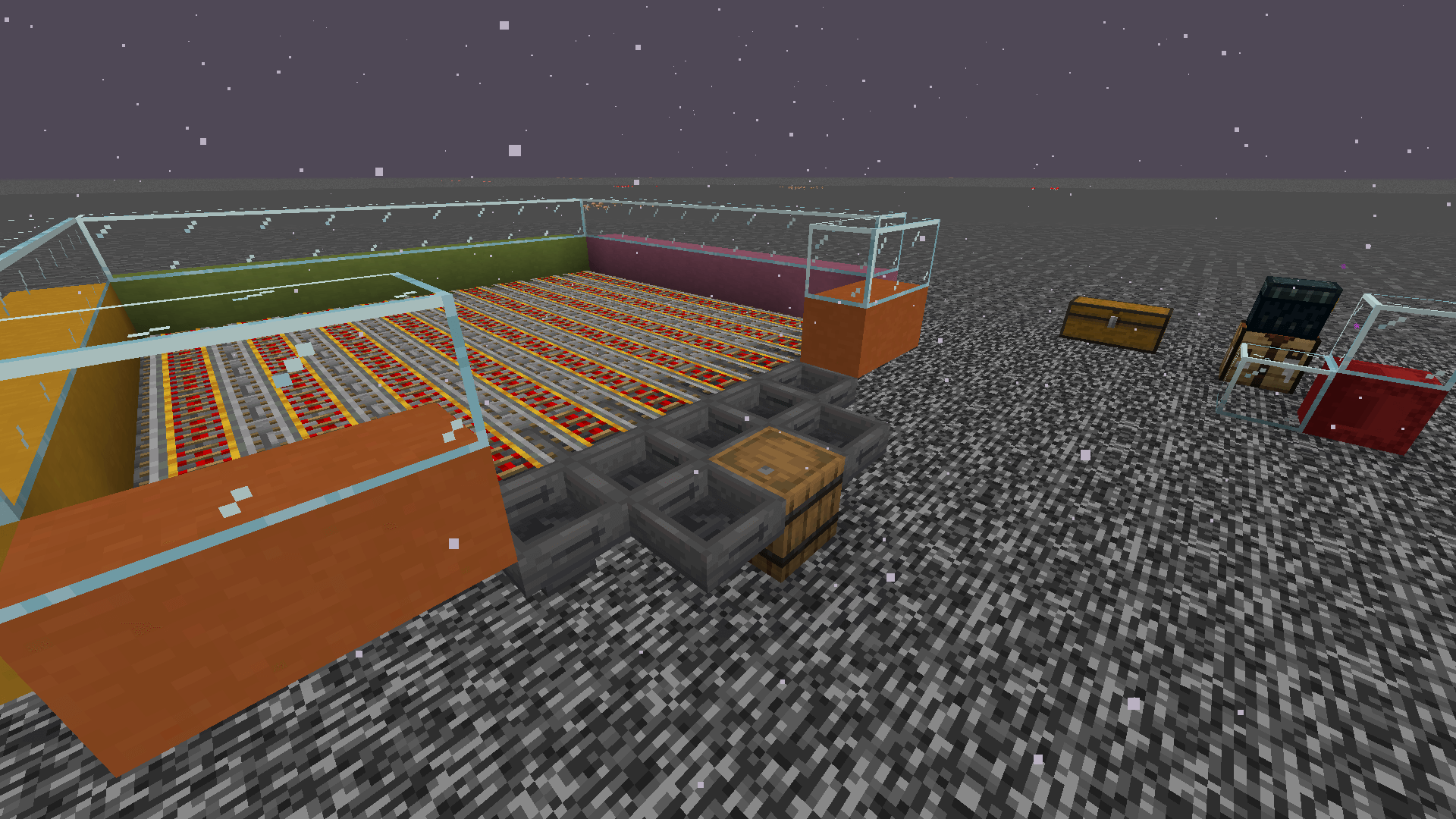 A minecart rail-based item collection system on the nether roof, with all the items directed by hoppers into a single barrel.