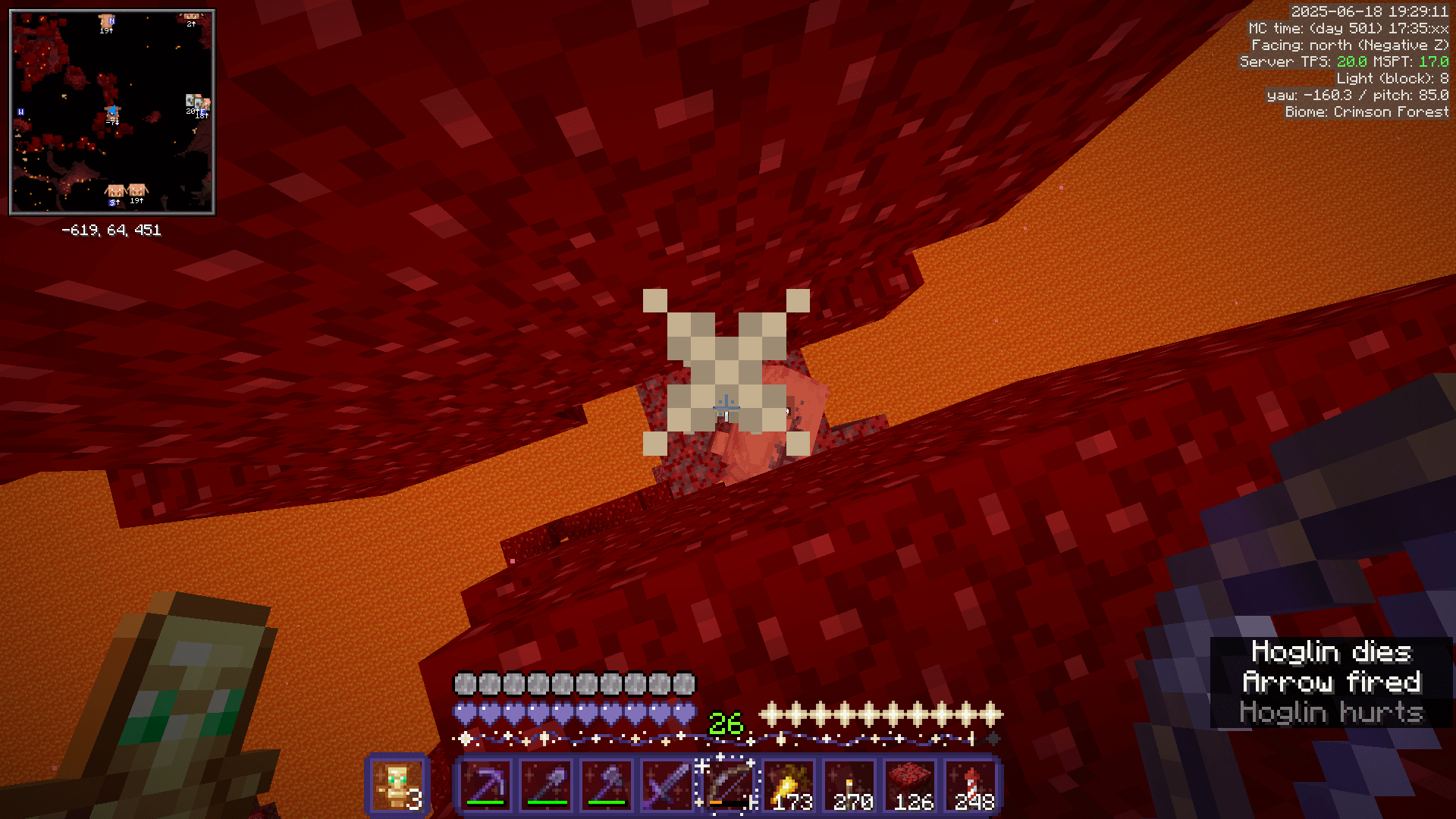 Standing on the edge of a crimson tree, shooting straight down at a hoglin, on a small crimson nylium island with a lava ocean far below.