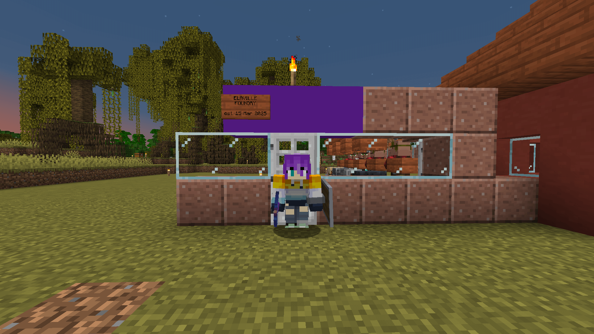 "I'll build the back eventually" – Grian A Minecraft player stands in front of a building with four villagers inside.