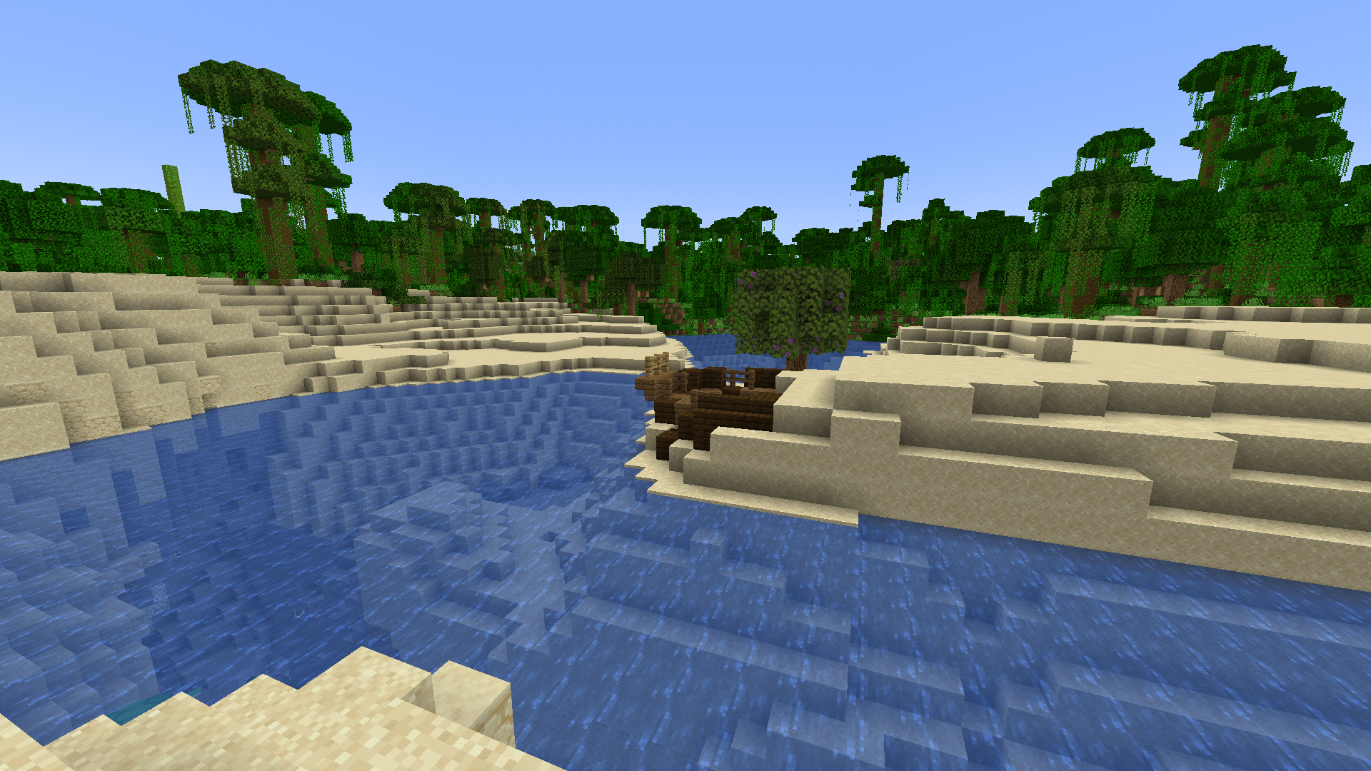 Not that boat. It's beached as bro! There's some Kiwi slang for ya :P A winding river with sandy banks. In the center of view is a shipwreck embedded in sand, with an acacia tree nearby.