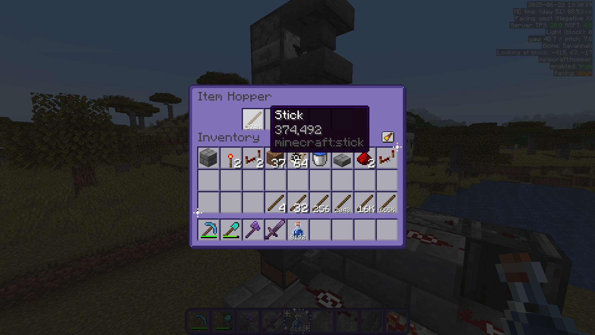 A stack of 374,492 sticks in a hopper. Outside the GUI, the number 2 is visible on the redstone dust, indicating that the comparator signal from this hopper is 2.