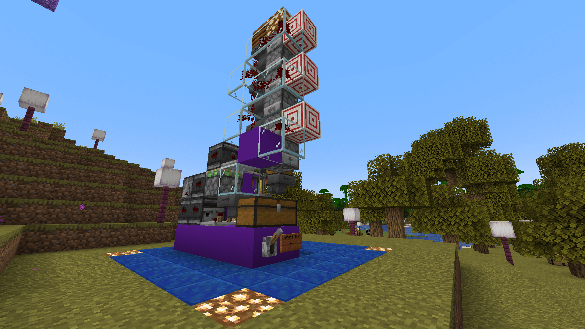 A redstone contraption for brewing potions, using a tower of droppers to feed in the potion ingredients.