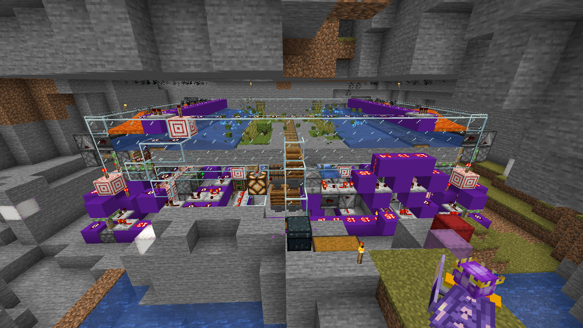 A large redstone contraption that generates stone blocks, turns them to moss, and composts the moss to create bonemeal.