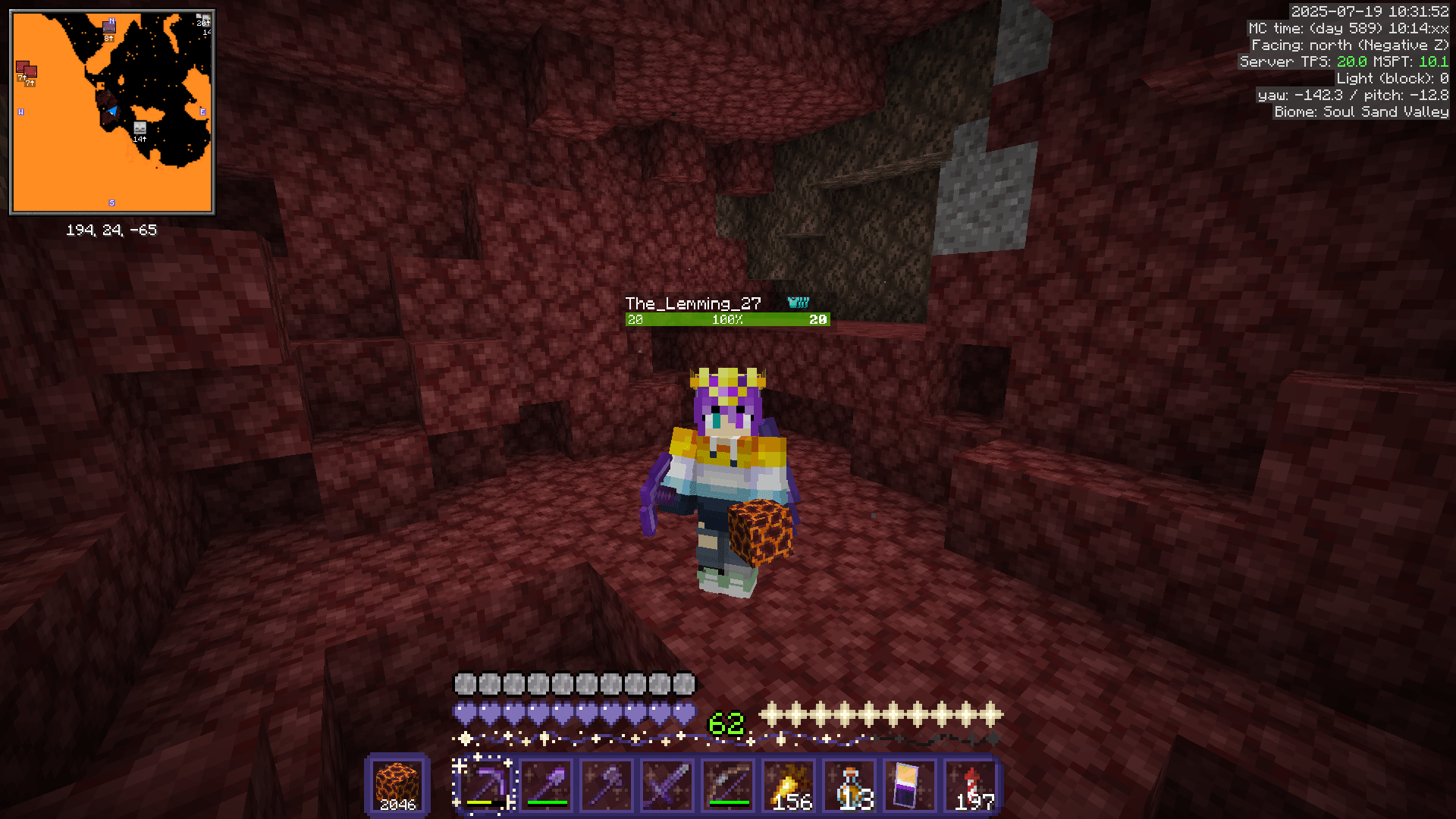 Ela stands in a netherrack pit holding a stack of 2,046 magma blocks.