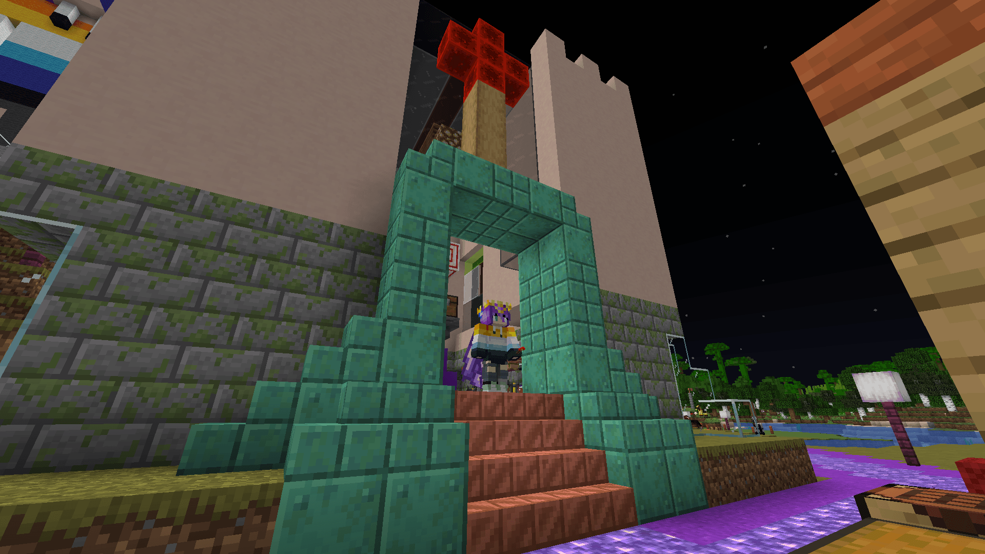 Ela stands in the entrance of the church, which now features a trim of oxidised copper blocks.