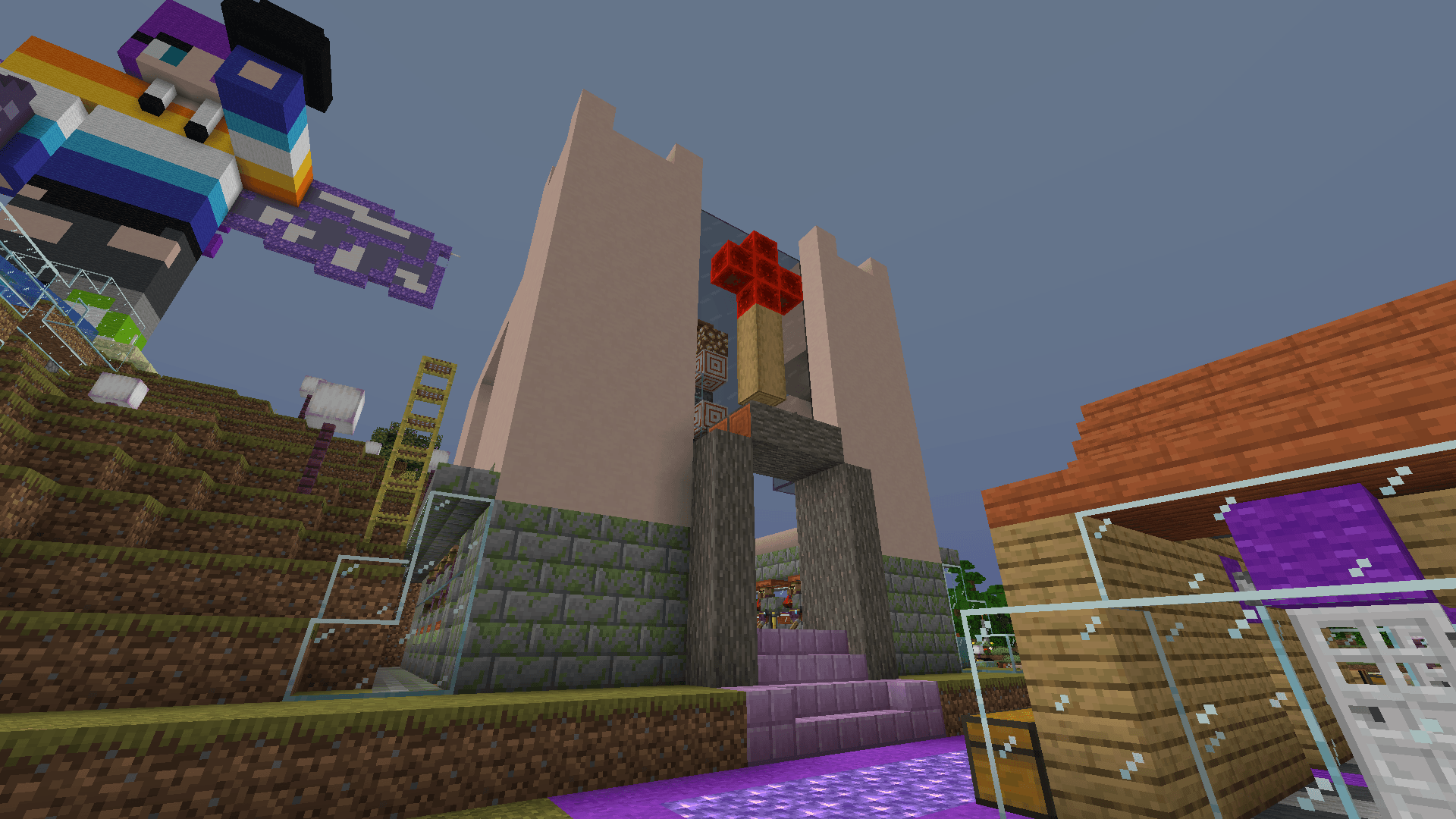 The front of a church structure, with a redstone torch/cross hanging over the entrance.