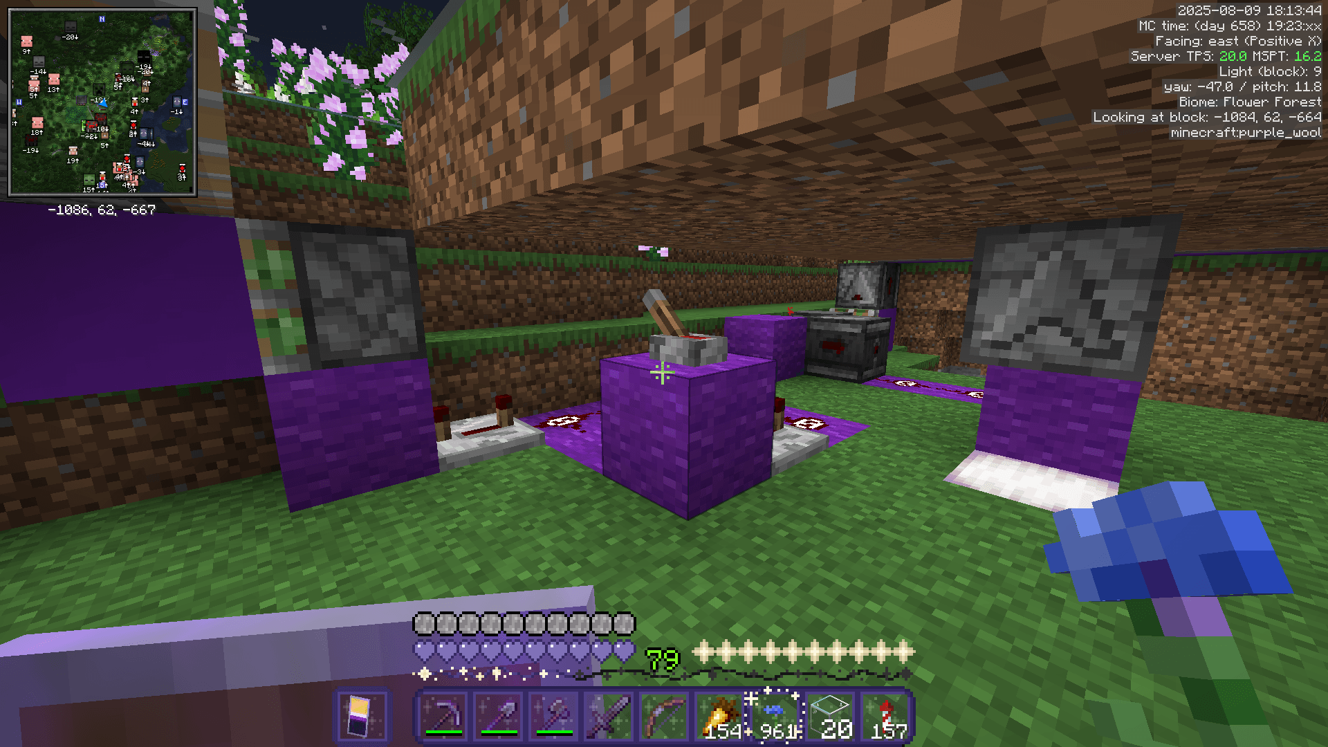 A redstone contraption beneath a grass block floor, with a lever connected to a dispenser and a number of pistons.