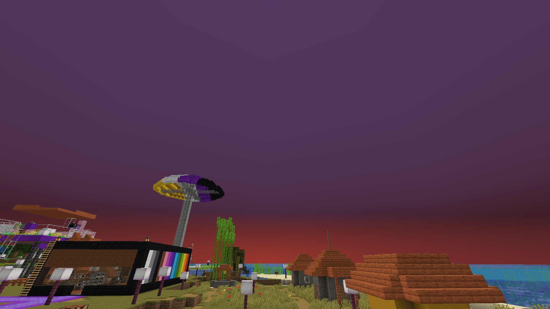 A cloudy sunrise over Elaville. There is a layer of reddish-orange on the horizon, giving way to a greyish purple sky overhead.