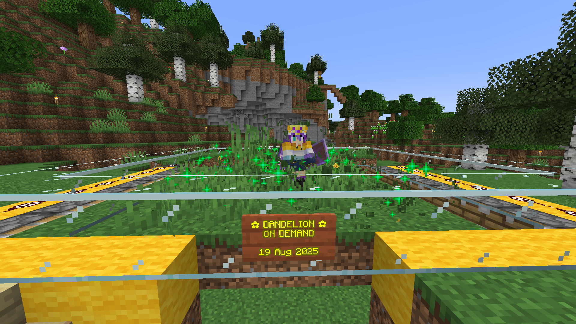 Ela stands in a shifting-floor dandelion farm as it runs. A ravine cuts through the terrain behind, leading to a cliff with trees on top.