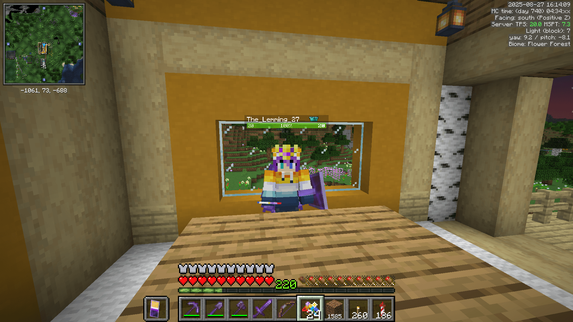 Ela sits at a table, ready to eat a Full Stack Salad.