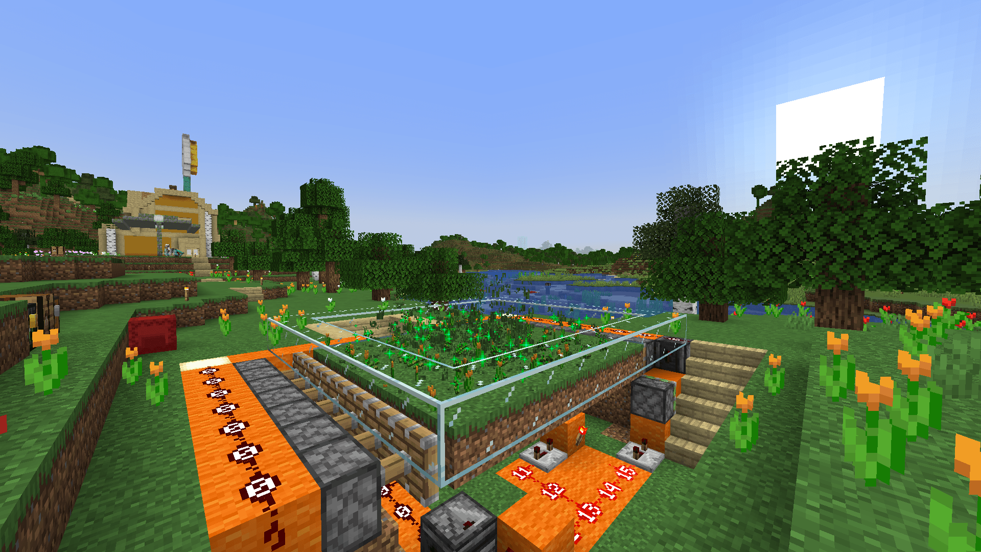 A redstone contraption to produce orange tulips by bonemealing grass then pushing it back and forth with pistons.