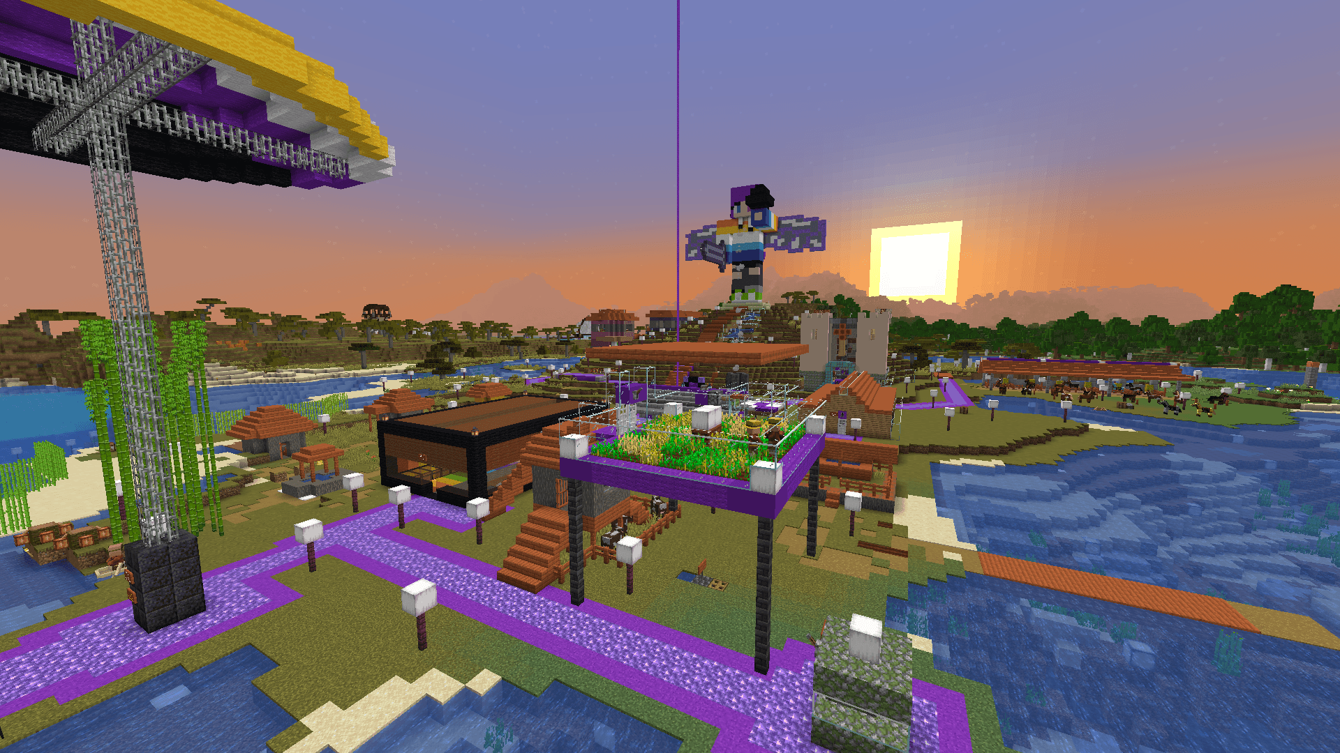 Elaville at sunset, now with a purple beacon beam shooting up from the centre.