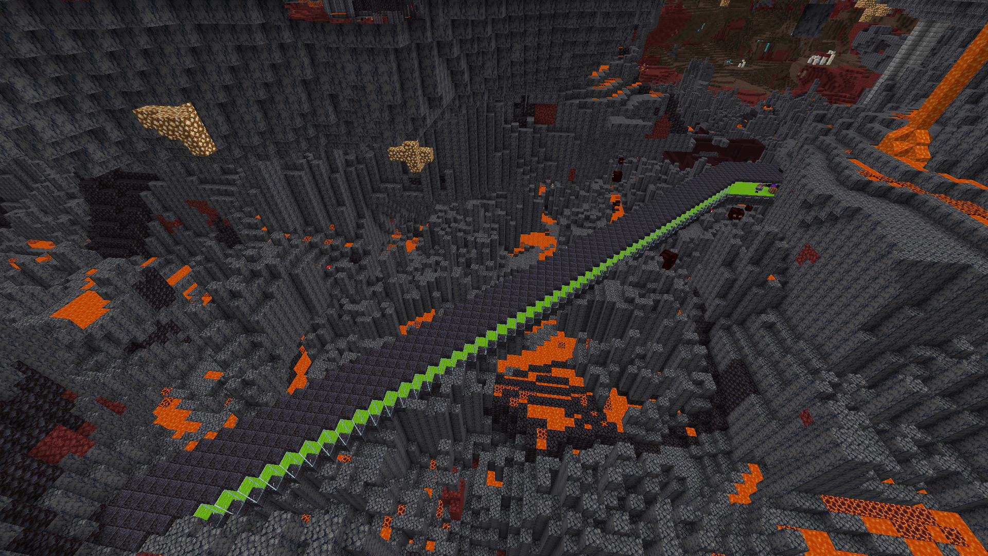 A bridge across a section of basalt deltas, made from blackstone slabs, glass, and lime carpet.