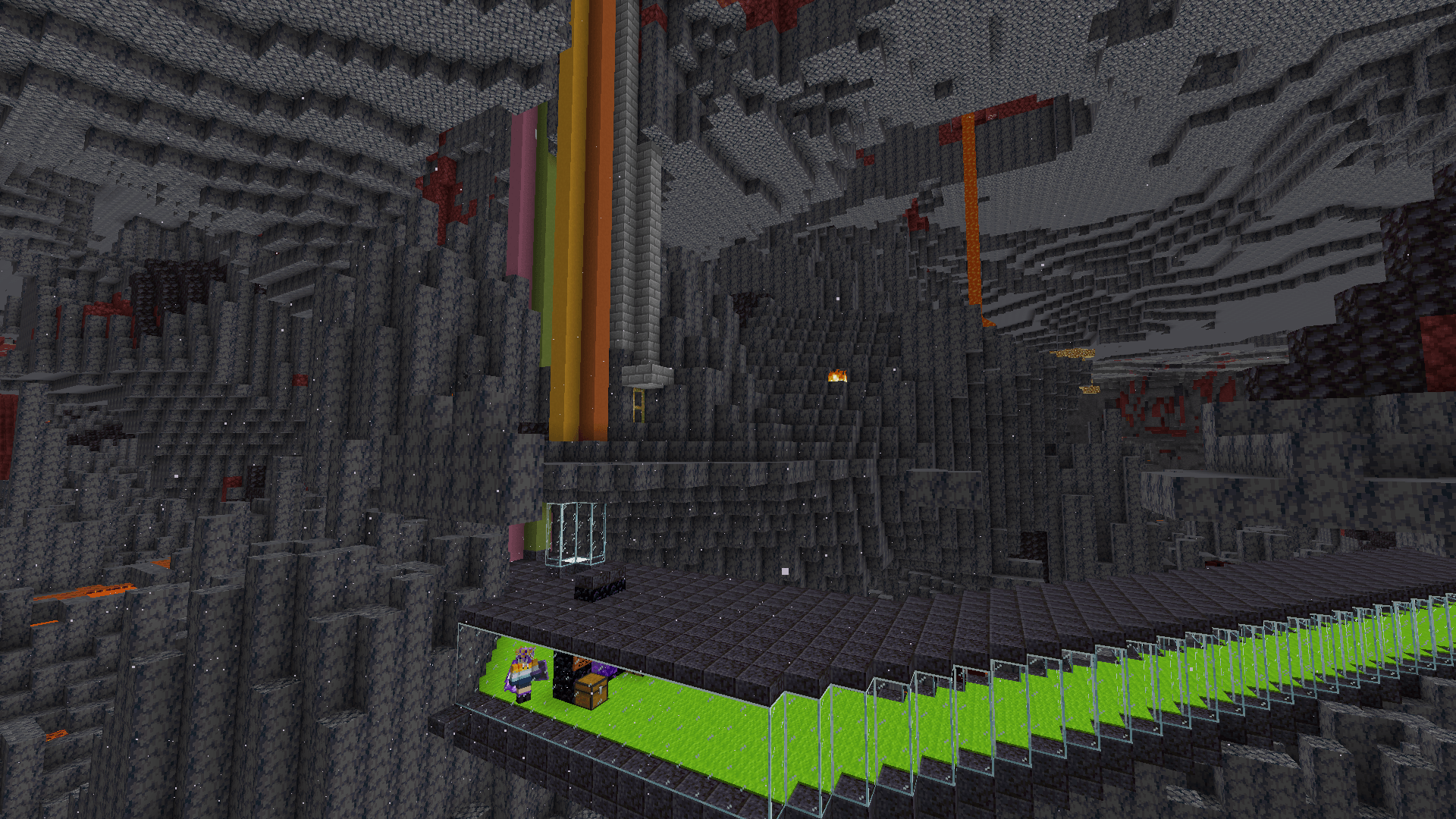 Ela looks out to the nether from the blackstone tunnel. Behind them, two coloured terracotta pillars reach up towards the nether roof.