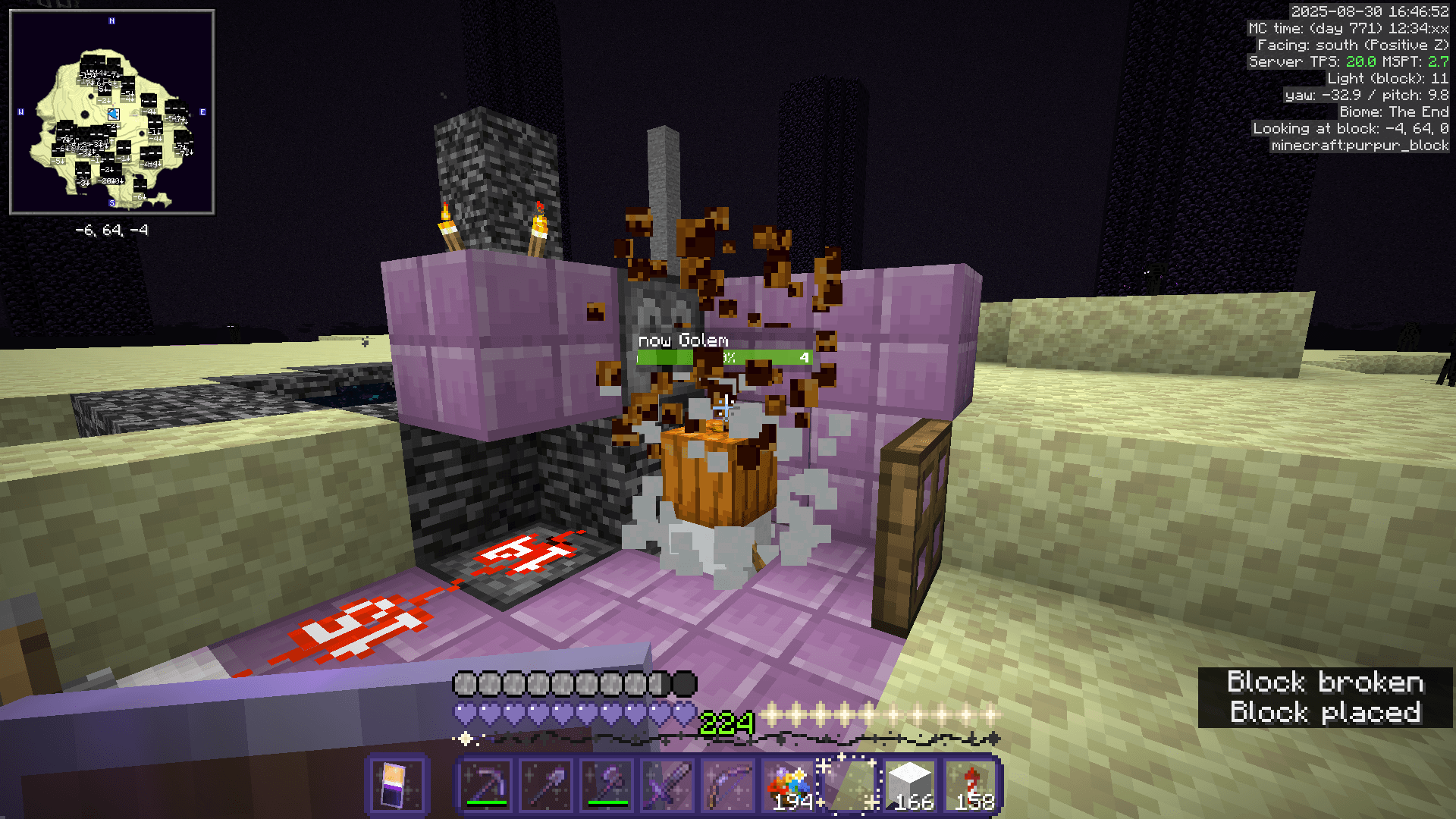 A redstone contraption, consisting of a rapid-fire observer circuit and two dispensers, to spawn snow golems at the end exit portal.